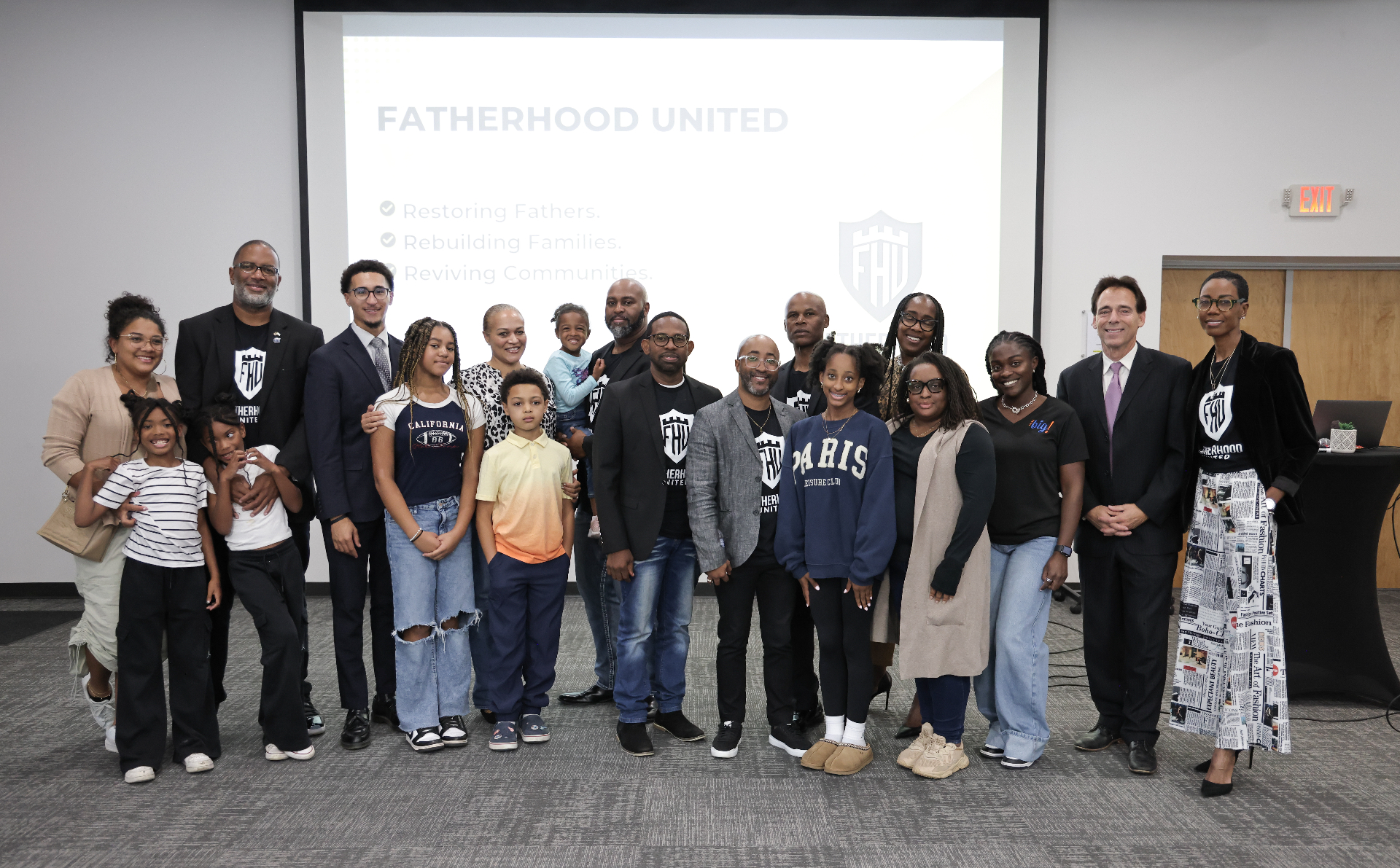 TC Bell with the Fatherhood United team and families