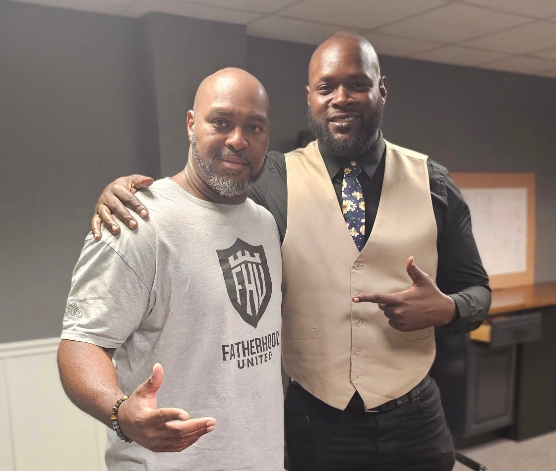 TC Bell with a professional colleague at an event