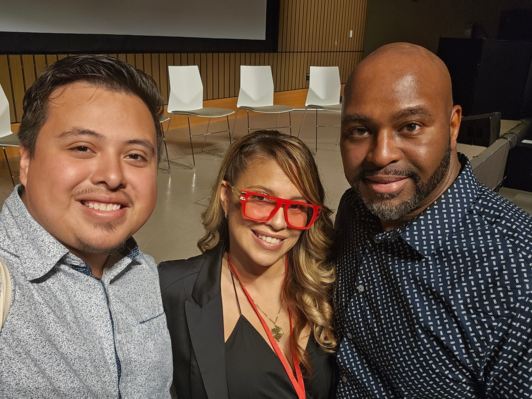TC Bell at a leadership event with fellow presenters