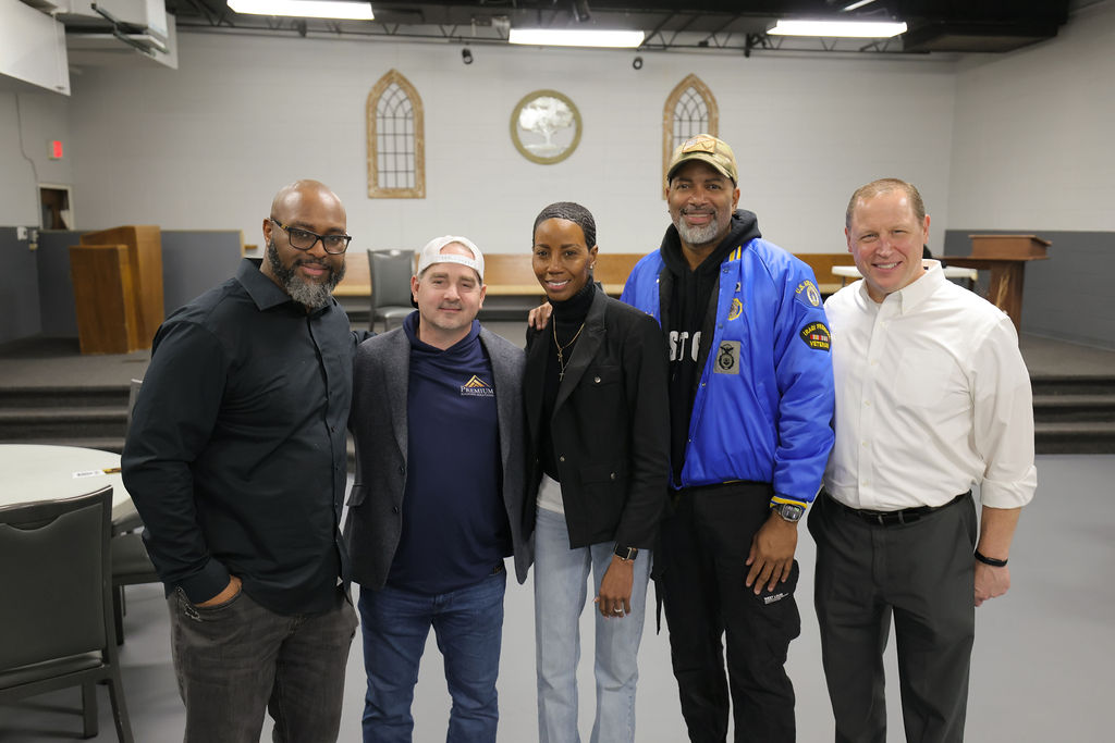 TC Bell with event organizers and partners