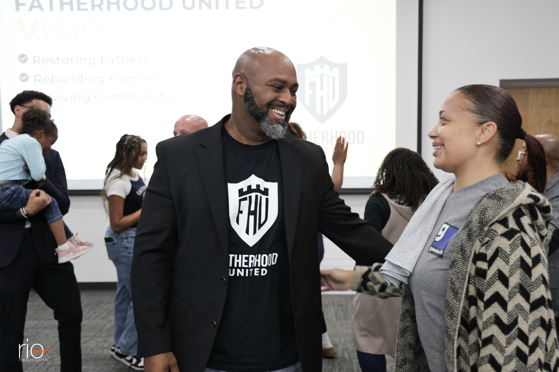 TC Bell sharing a laugh at a Fatherhood United gathering