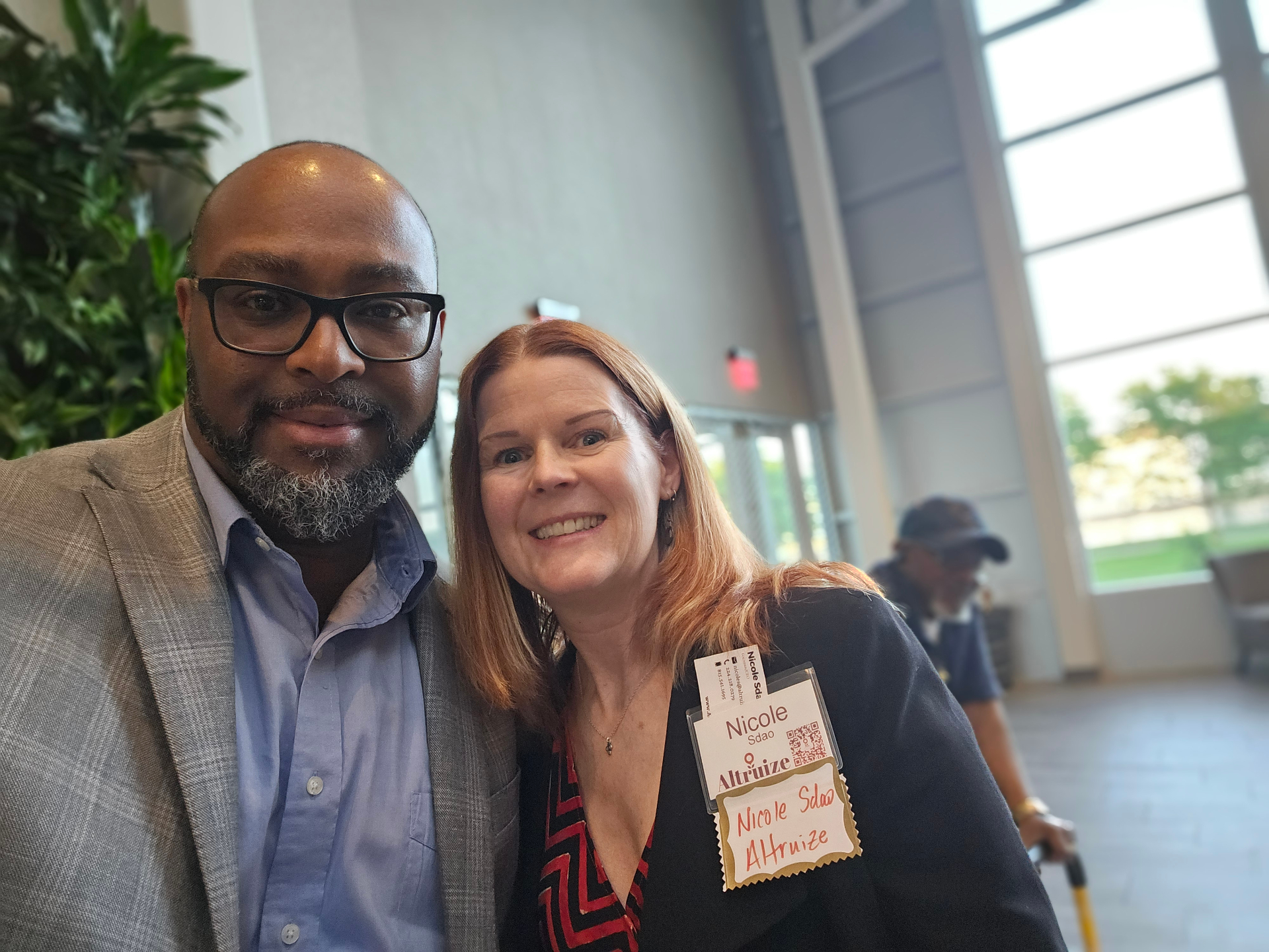 TC Bell with Nicole Sdao of Altruize at a networking event