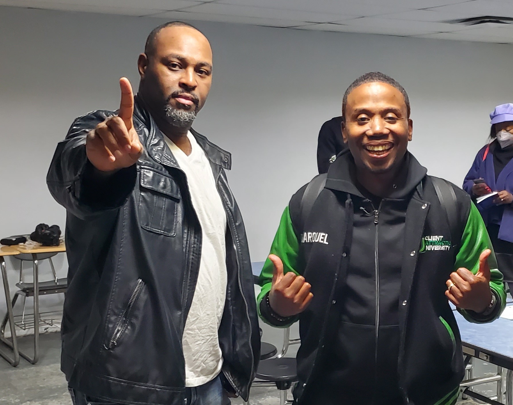 TC Bell and Marquel Bryant sharing a light moment at an event